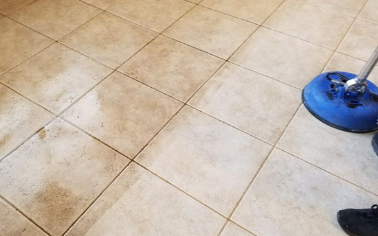 a tile floor in the middle of being cleaned in chandler